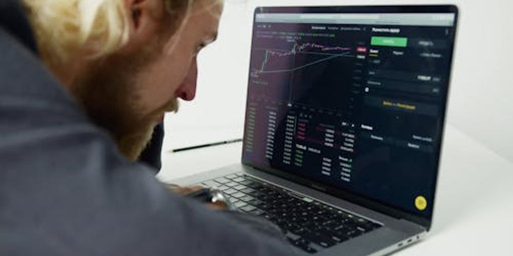 trader analyzing forex market charts